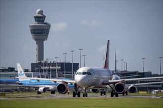 Aircraft at Amsterdam Schiphol Airport, on the taxiway for take-off on the Aalsmeerbaan, 18L/36R,