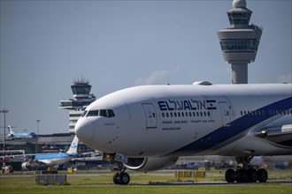 Aircraft at Amsterdam Schiphol Airport, on the taxiway for take-off on the Aalsmeerbaan, 18L/36R,