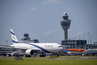 Aircraft at Amsterdam Schiphol Airport, on the taxiway for take-off on the Aalsmeerbaan, 18L/36R,