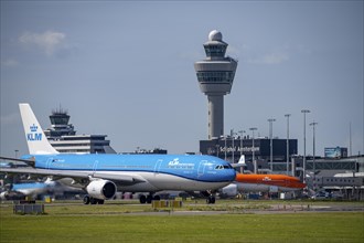 Aircraft at Amsterdam Schiphol Airport, on the taxiway for take-off on the Aalsmeerbaan, 18L/36R,