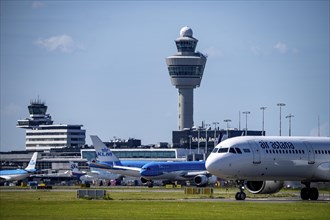 Aircraft at Amsterdam Schiphol Airport, on the taxiway for take-off on the Aalsmeerbaan, 18L/36R,