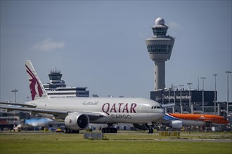 Aircraft at Amsterdam Schiphol Airport, on the taxiway for take-off on the Aalsmeerbaan, 18L/36R,