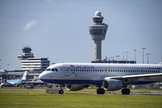 Aircraft at Amsterdam Schiphol Airport, on the taxiway for take-off on the Aalsmeerbaan, 18L/36R,