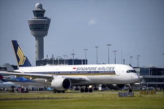 Aircraft at Amsterdam Schiphol Airport, on the taxiway for take-off on the Aalsmeerbaan, 18L/36R,