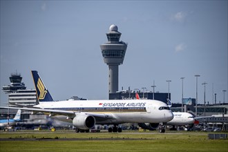 Aircraft at Amsterdam Schiphol Airport, on the taxiway for take-off on the Aalsmeerbaan, 18L/36R,