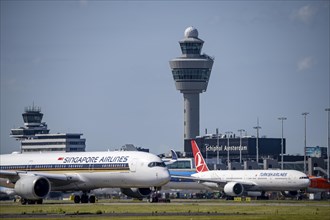 Aircraft at Amsterdam Schiphol Airport, on the taxiway for take-off on the Aalsmeerbaan, 18L/36R,