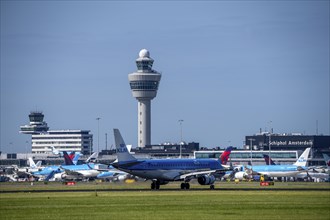 KLM Embraer E190STD aircraft landing at Amsterdam Schiphol Airport, Buitenveldertbaan, 09/27, Air