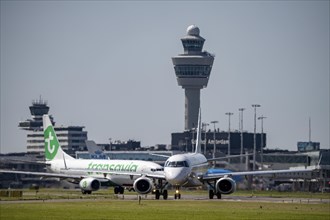 Aircraft at Amsterdam Schiphol Airport, on the taxiway for take-off on the Aalsmeerbaan, 18L/36R,