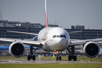 Emirates Skycargo Boeing 777, aircraft at Amsterdam Schiphol Airport, on the taxiway for take-off