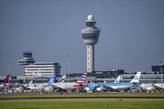 Aircraft at Amsterdam Schiphol Airport, taxiway, apron, air traffic control tower, terminal,