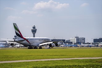 Emirates Airbus A380 aircraft landing at Amsterdam Schiphol Airport, Buitenveldertbaan, 09/27, Air