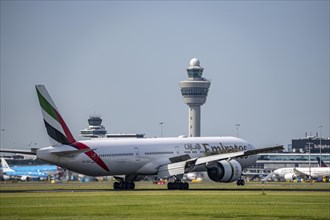 Emirates Boeing 777-31H, aircraft landing at Amsterdam Schiphol Airport, Buitenveldertbaan, 09/27,