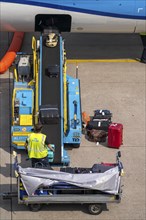 Amsterdam Schiphol Airport, loading baggage onto a plane, Boeing 737, Netherlands