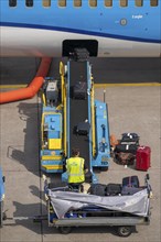 Amsterdam Schiphol Airport, loading baggage onto a plane, Boeing 737, Netherlands