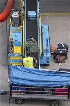 Amsterdam Schiphol Airport, loading baggage onto a plane, Boeing 737, Netherlands