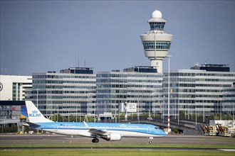 Amsterdam Schiphol Airport, KLM aircraft, Embraer E190STD, on the taxiway, in the background