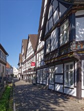 City centre of Höxter, street Am Rathaus, with historic half-timbered houses. Höxter,