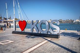 I Love Kos statue at the harbour of Kos Town on the island of Kos, Kos Town, Kos, Greece, Europe