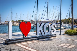 I Love Kos statue at the harbour of Kos Town on the island of Kos, Kos Town, Kos, Greece, Europe