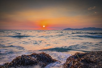 Beach on the island of Kos near the town of Mastichari in summer at sunset, Mastichari, Kos,