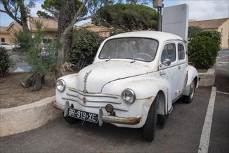 Old Renault 4cv, standing at the harbour of Saint Tropez, Provence-Alpes-Côte d'Azur, France,