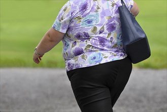 Symbol photo woman with overweight