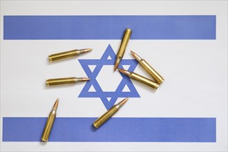 Israeli flag with cartridges, Middle East conflict