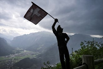 Sculpture flag-waver Harder Kulm viewpoint, Interlaken, Switzerland, Europe