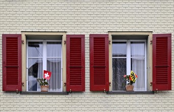 Window with Swiss and Bernese flags