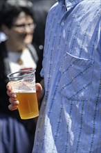 Man with beer cup