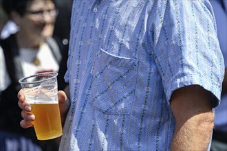 Man with beer cup