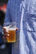 Man with beer cup