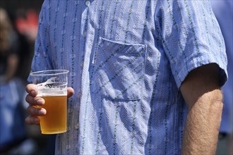 Man with beer cup