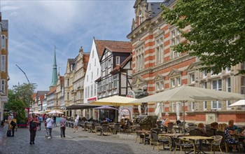 Hameln city centre, Osterstrasse, a pedestrian zone with cobblestones and historic half-timbered