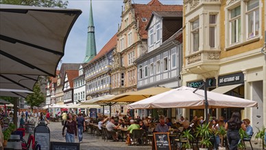 Hameln city centre, Osterstrasse, a pedestrian zone with cobblestones and historic half-timbered