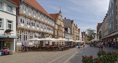 Hameln city centre, Osterstrasse, a pedestrian zone with cobblestones and historic half-timbered