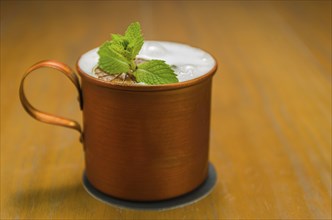 Delicious Moscow Mule drink copper cup close-up