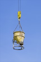 Concrete bucket of a construction crane, concrete silo, crane bucket