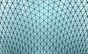 Interior view of the glass lattice roof over the great court in The British Museum, London,