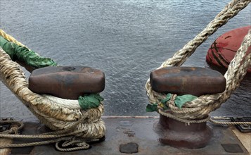 Hamburg, 19.06.2009, Ships are fastened with ropes to bollards in the harbour, Hamburg, Germany,