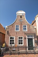 Gabled house at the harbour, Greetsiel, Krummhörn, East Frisia, Lower Saxony, Germany, Europe