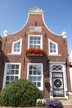 Gabled house at the harbour, Greetsiel, Krummhörn, East Frisia, Lower Saxony, Germany, Europe