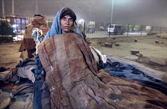 New Delhi, India, 21.01.2010, Homeless woman. Sleeping place under a bridge, India, Asia