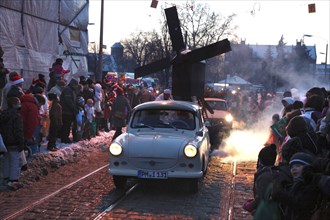 Parade of Father Christmases and Trabant drivers at the Father Christmas Parade in Brandenburg an