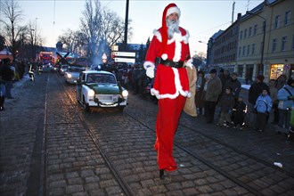 Parade of Father Christmases and Trabant drivers at the Father Christmas Parade in Brandenburg an