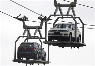 Bratislava, 05.10.2010, VW Touareg sport-utility vehicles are carried by a lift from an assembly