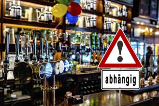 Symbolic image, warning sign for alcohol addiction, danger of addiction, alcohol abuse, health