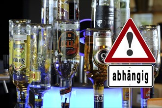 Symbolic image, warning sign for alcohol addiction, danger of addiction, alcohol abuse, health