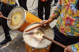 Drummers and their instruments performing during a typical street party in Brazil, Belo Horizonte,