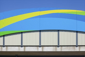 Colourfully painted motorway bridge with noise barrier over the river Este, Buxtehude, Altes Land,